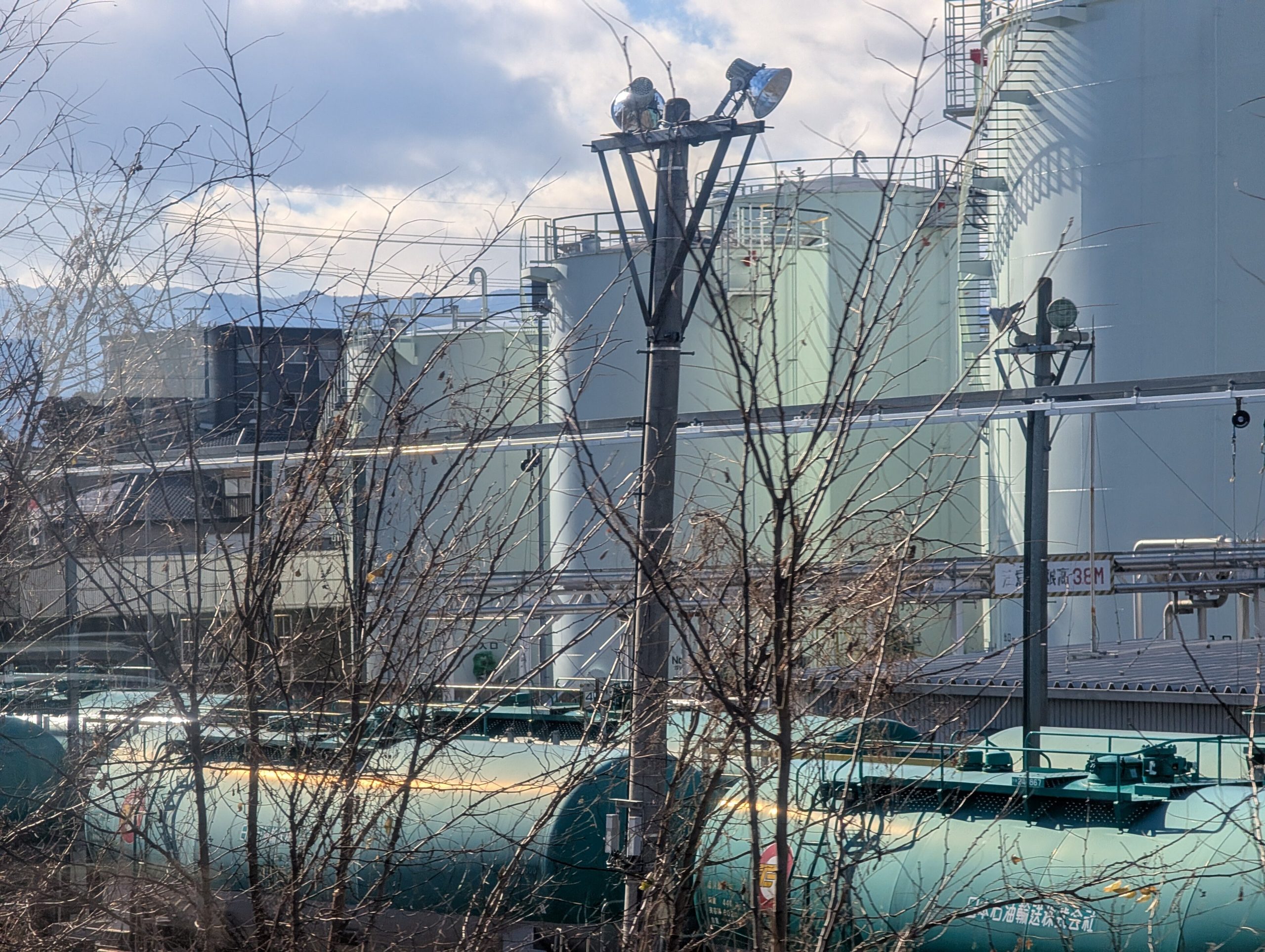 Fuel depot tanks beside a rail siding