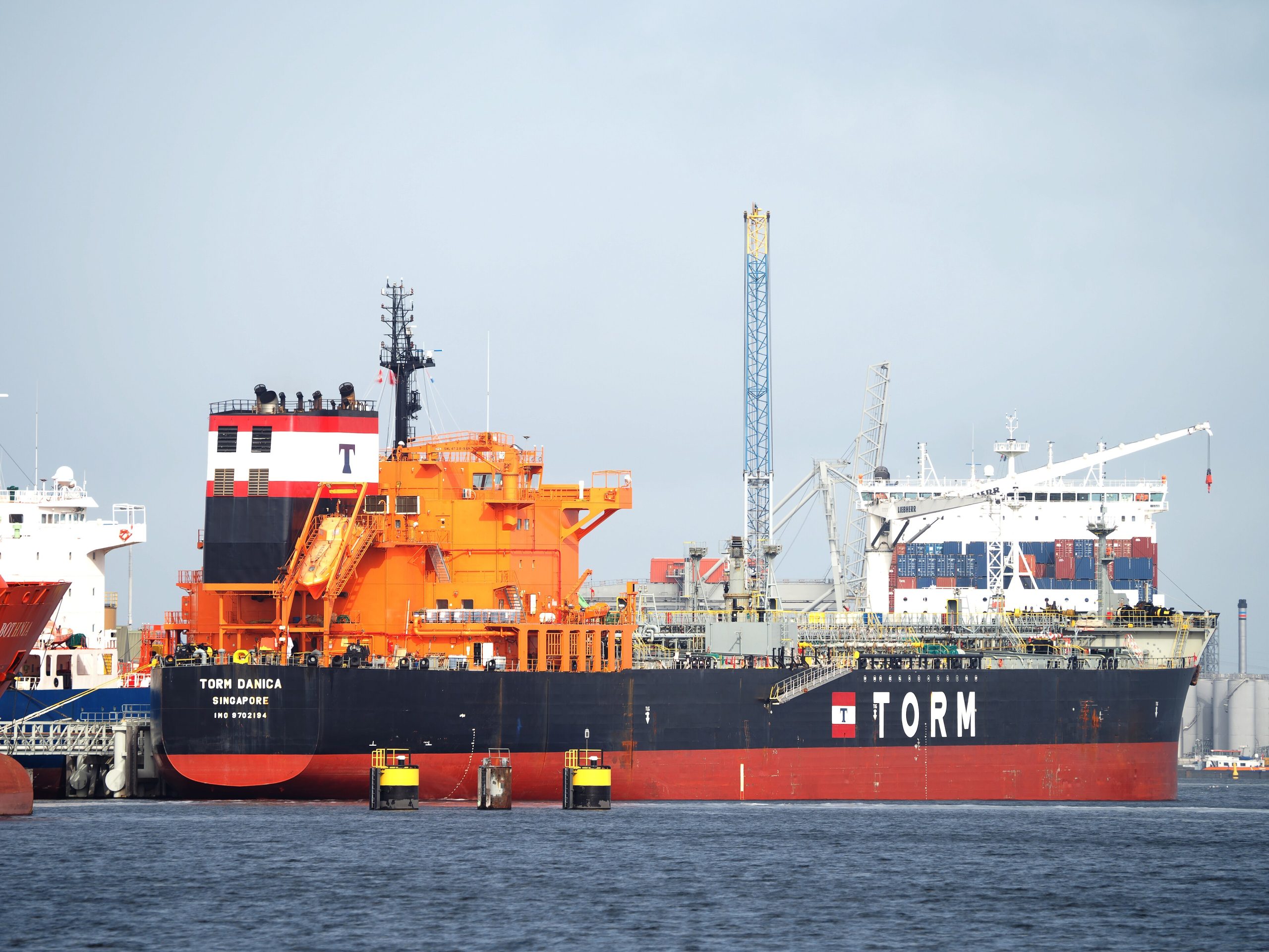 Chemical and oil products tanker alongside in port